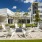 Exterior view of Rosalia Winter Park apartments in Winter Park, FL, featuring a modern facade and blue sky.