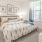 carpeted bedroom with large windows