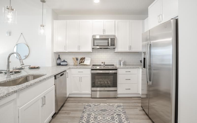 c-shaped kitchen with ample lighting